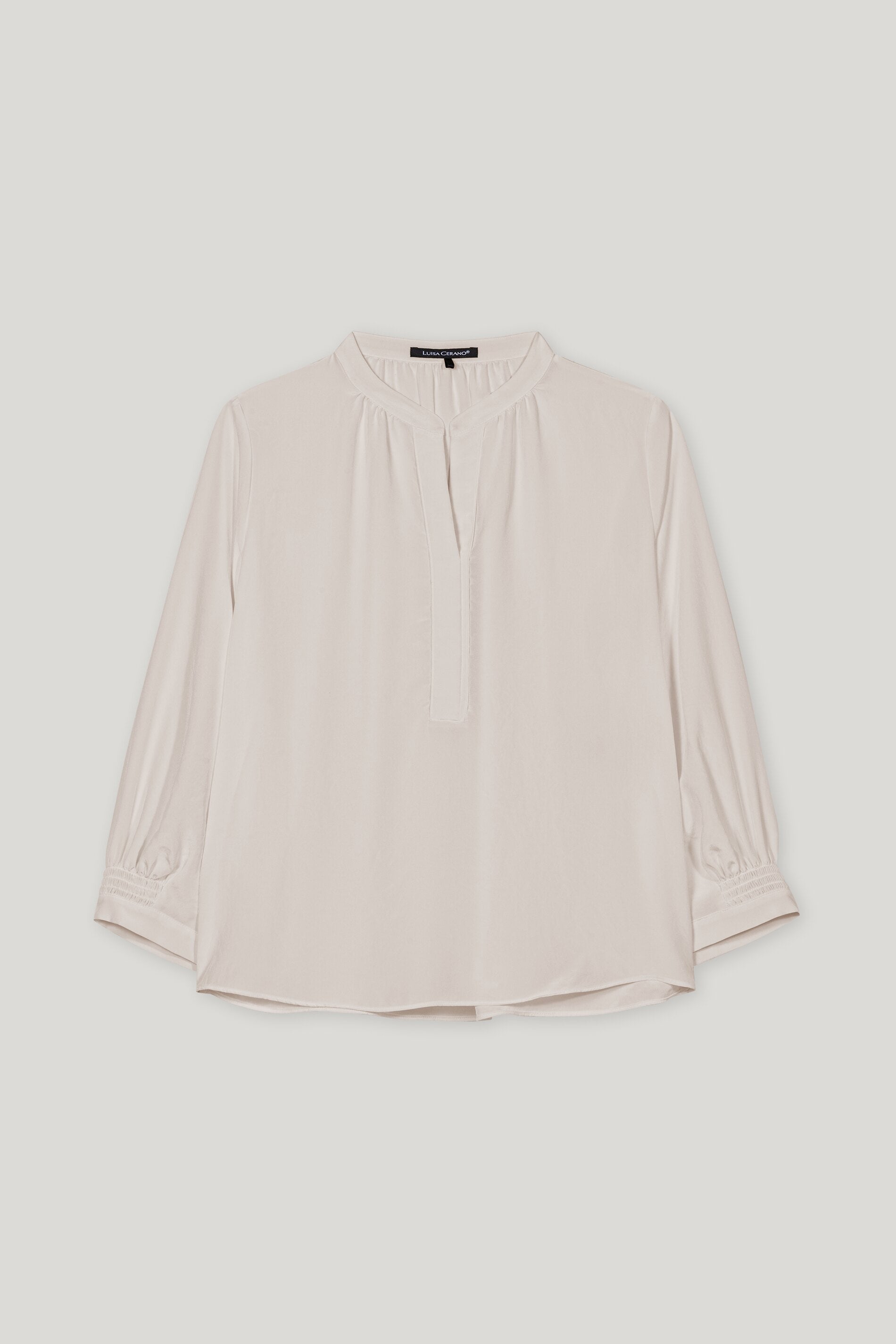 Bluse mit Smokdetail - oyster - Standard | Artikel Front